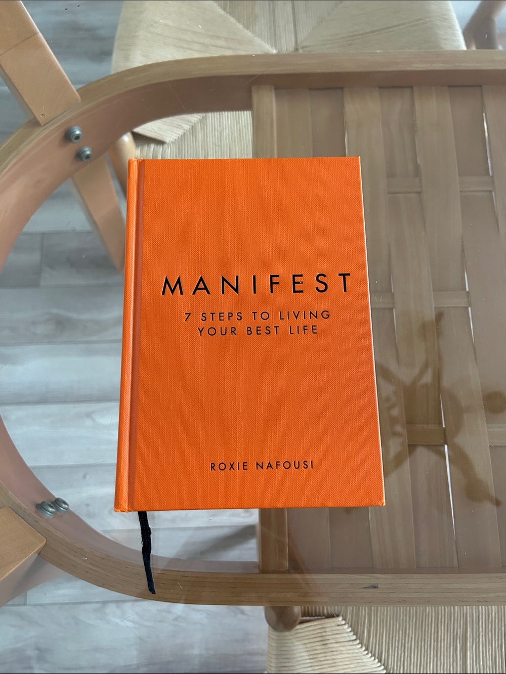 Manifest by Roxie Nafousi — Bright Orange Hardcover Book